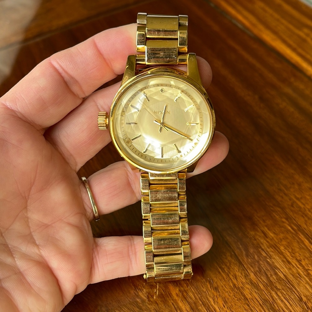 Nixon “The Cut Above “ facet watch.  Gold stainless steel